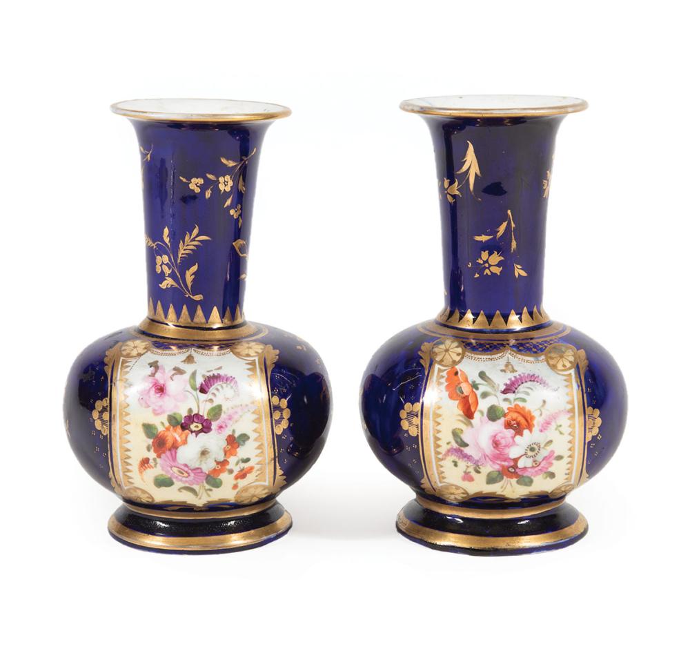 Appraisal: Pair of Sevres-Style Polychrome and Gilt Porcelain Bottle Vases thc