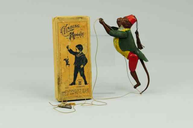 Appraisal: BOXED CLIMBING MONKEY Lehmann Germany lithographed and hand painted tin