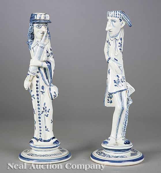 Appraisal: A Pair of Blue-and-White Delft Figural Candlesticks humorous caricatures of