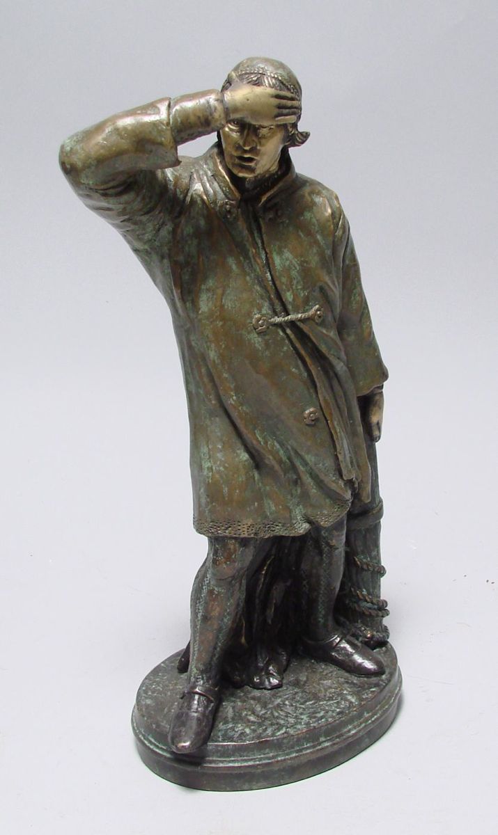 Appraisal: BRONZE STATUE OF A FISHERMAN Wearing oilskins and holding a