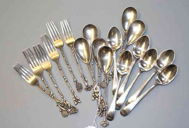 Appraisal: A SET OF SIX INDONESIAN SILVER SPOONS AND FORKS decorated