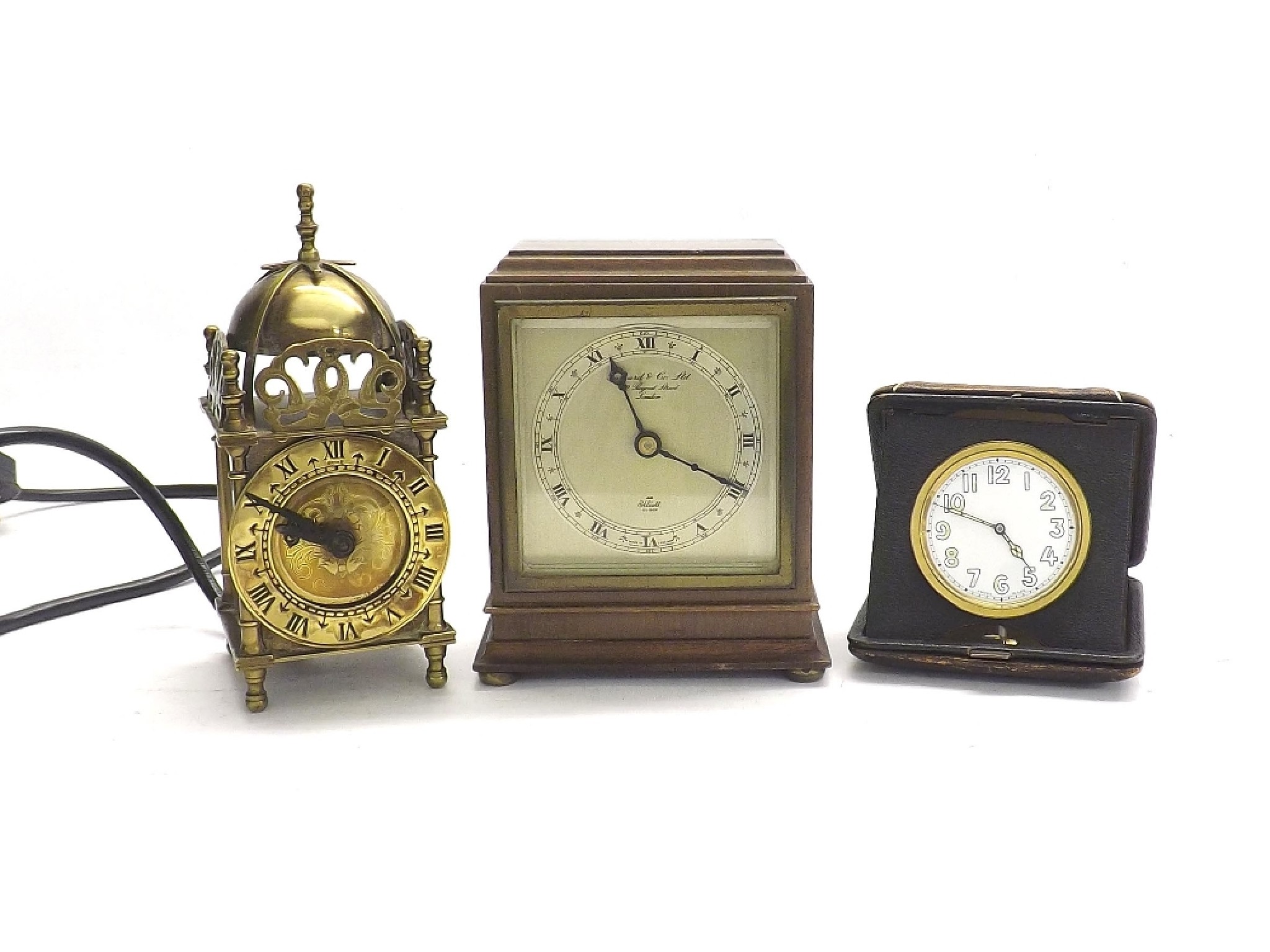 Appraisal: Small electric lantern clock high also a small Garrard Co