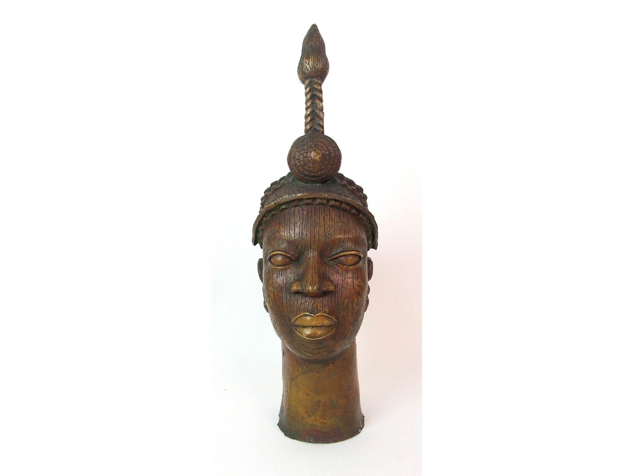 Appraisal: A Benin female brass headwith high tied hair ornament with