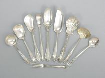 Appraisal: Ten Sterling Silver Items This lot features a three-piece cheese