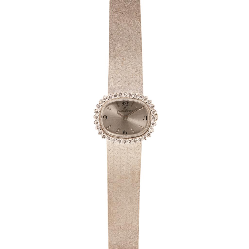 Appraisal: BUCHERER - A lady's diamond set wrist watch the oval