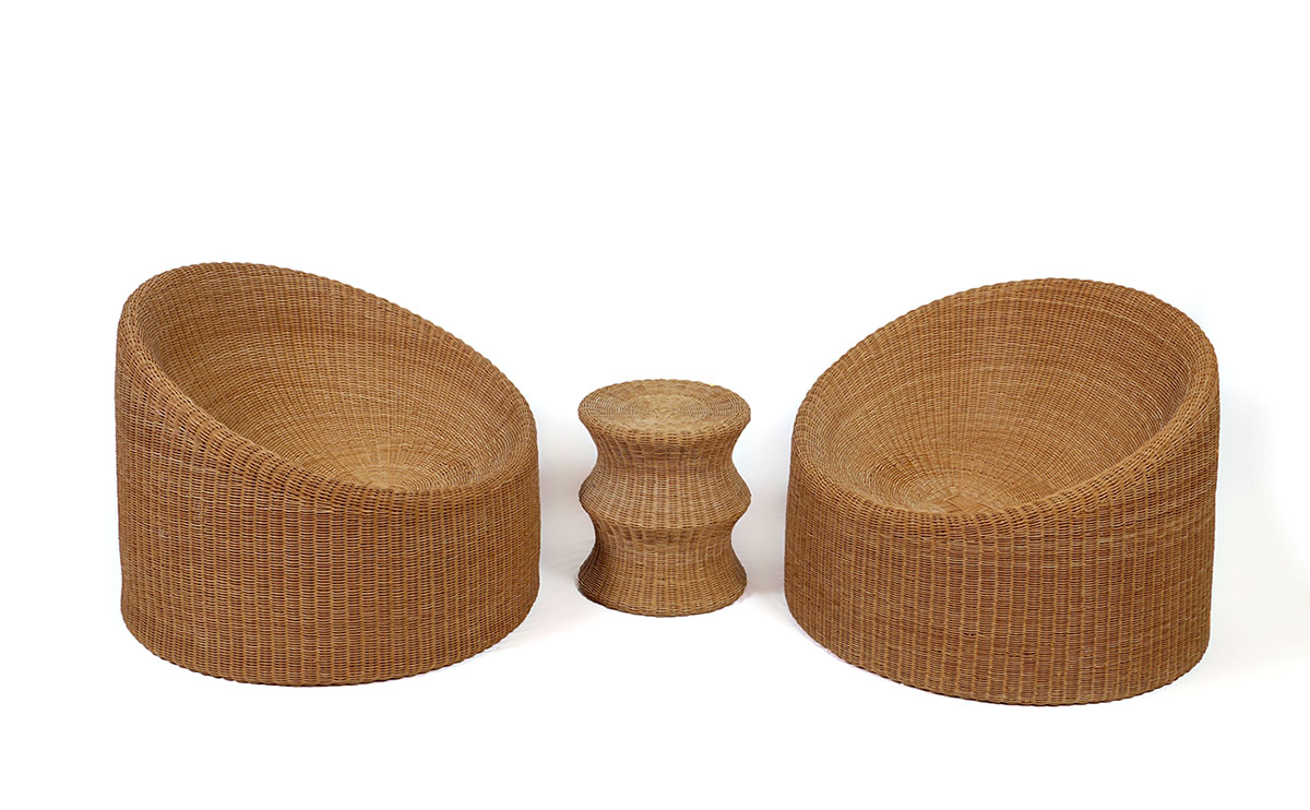 Appraisal: PAIR EERO AARNIO ELEPHANT BOOT RATTAN CHAIRS Comprising of chairs