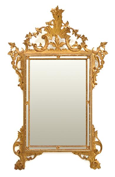 Appraisal: A FLORENTINE STYLE GILT WOOD FRAMED WALL MIRROR the rectangular