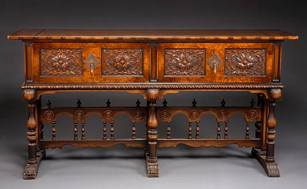 Appraisal: A Spanish Baroque style walnut credenza Berkey and Gay first