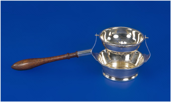 Appraisal: Silver Tea Strainer With Fruit Wood Handle Fully Hallmarked For