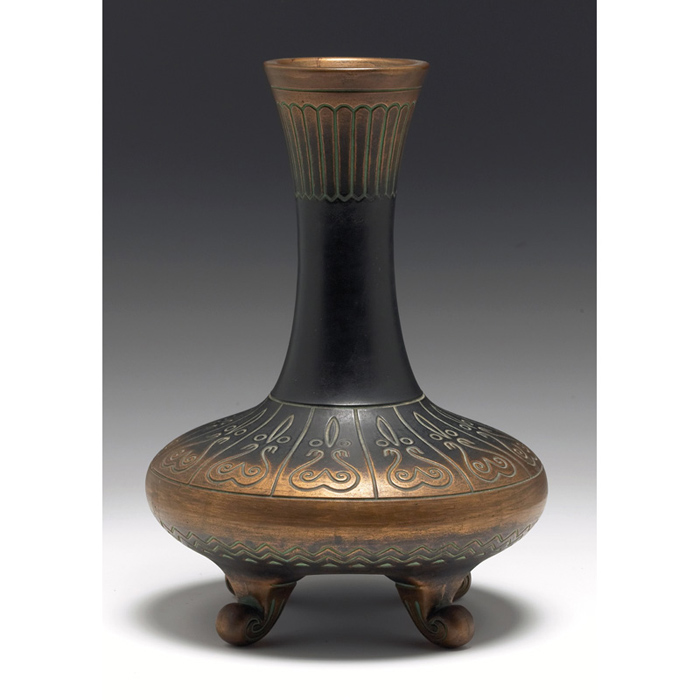 Appraisal: Nourse vase footed shape with a broad bottom and incised