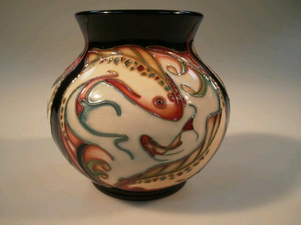 Appraisal: A Moorcroft Shoal pattern vase decorated with fish circa cm