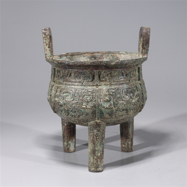 Appraisal: Chinese bronze archaistic tripod ding with allover molded and incised