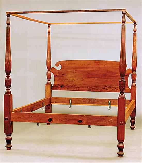 Appraisal: Charleston style walnut rice bed th centuryturned and reeded tall