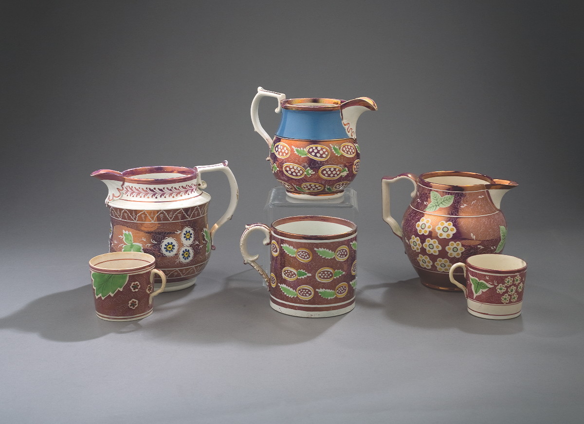 Appraisal: STAFFORDSHIRE ENAMEL-DECORATED AND PURPLE LUSTRE JUG AND A CHILDREN'S MUG