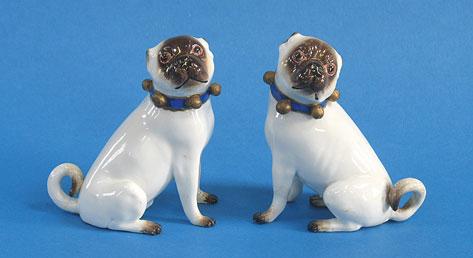 Appraisal: A PAIR OF MEISSEN PUGS of th century design modelled