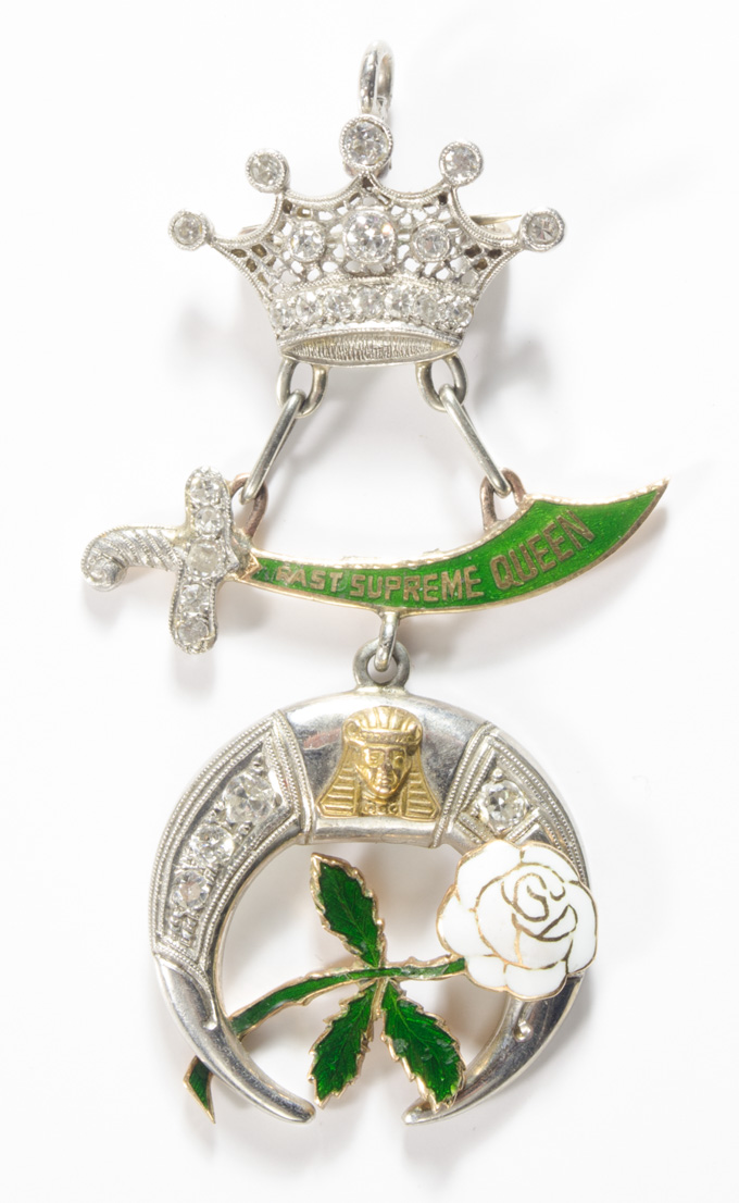 Appraisal: DAUGHTERS OF THE NILE PENDANT PIN k white and yellow