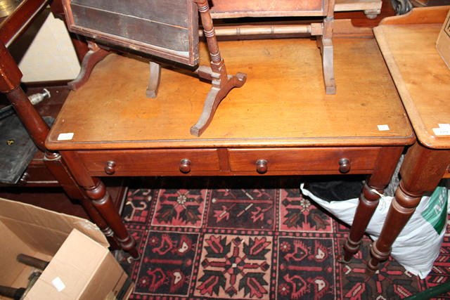 Appraisal: A VICTORIAN MAHOGANY SIDE TABLE the low raised back over