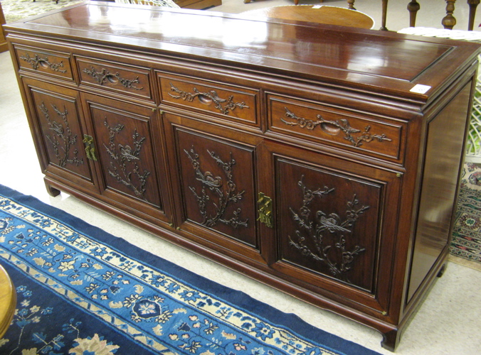 Appraisal: CARVED ROSEWOOD BUFFET Chinese mid th century the front featuring