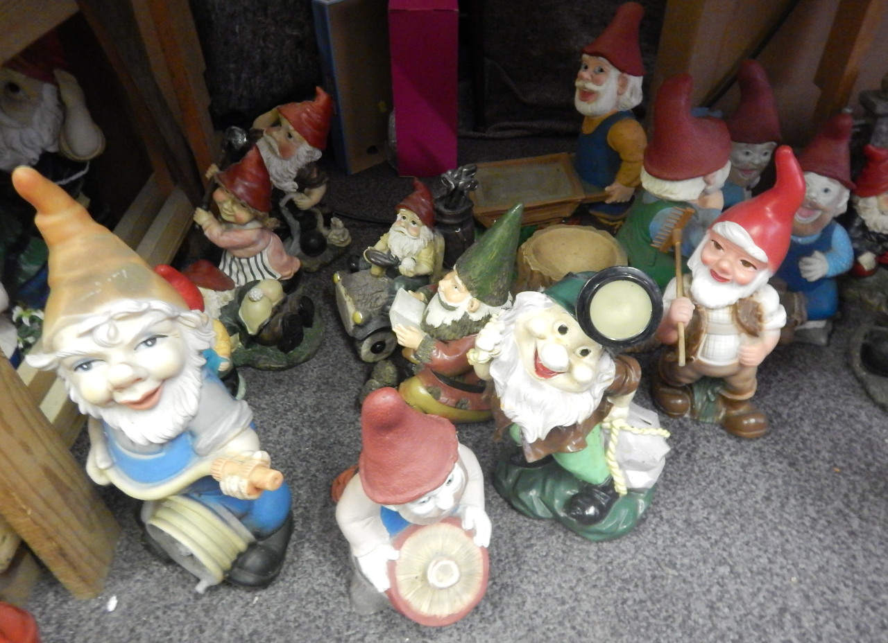 Appraisal: Various composition and other garden gnomes to include a golfing