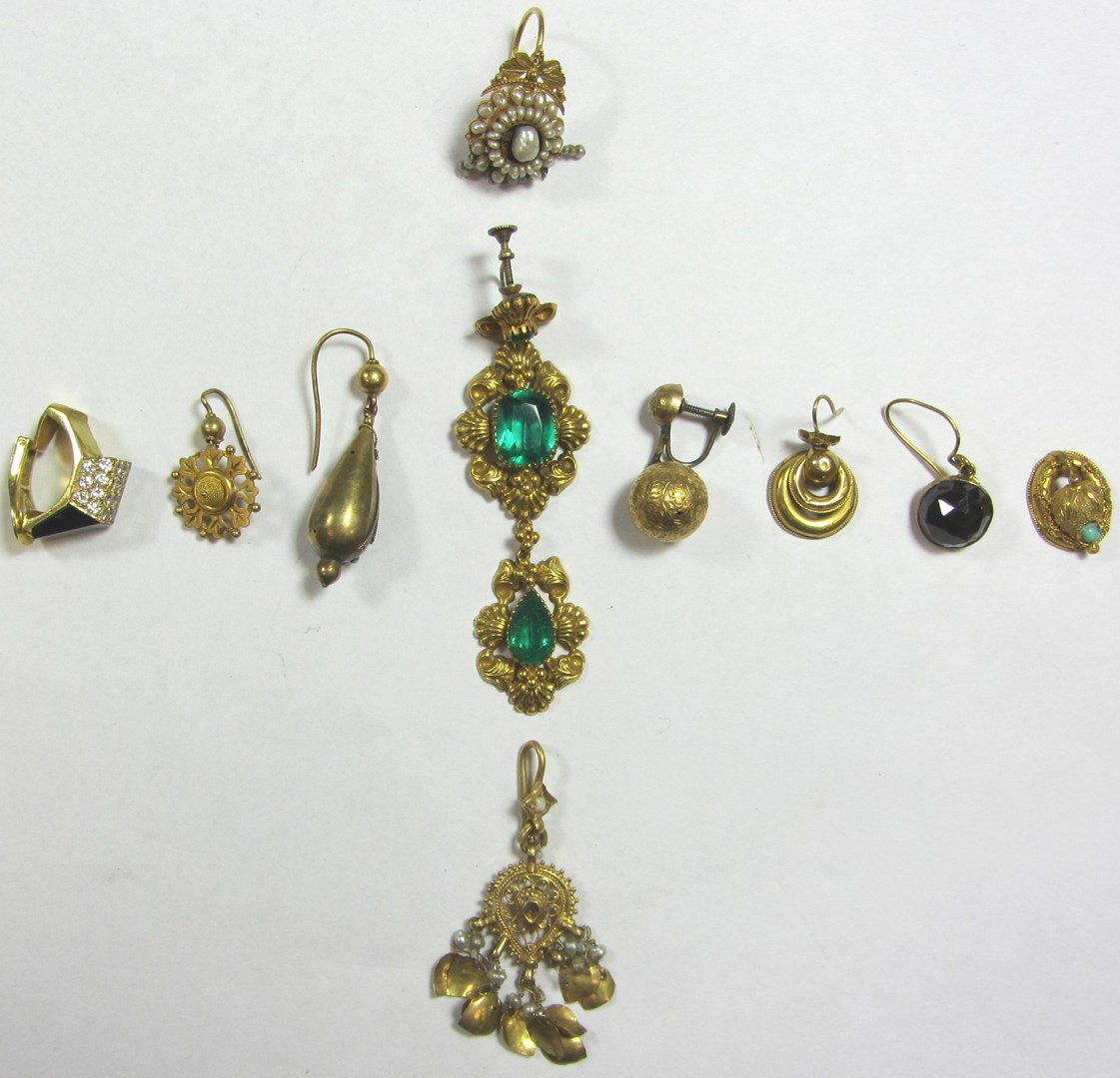 Appraisal: A collection of ten mostly gold odd earrings including an