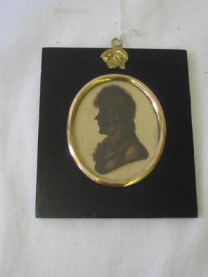 Appraisal: ENGLISH SCHOOL A Regency Gentleman silhouette oval profile to left