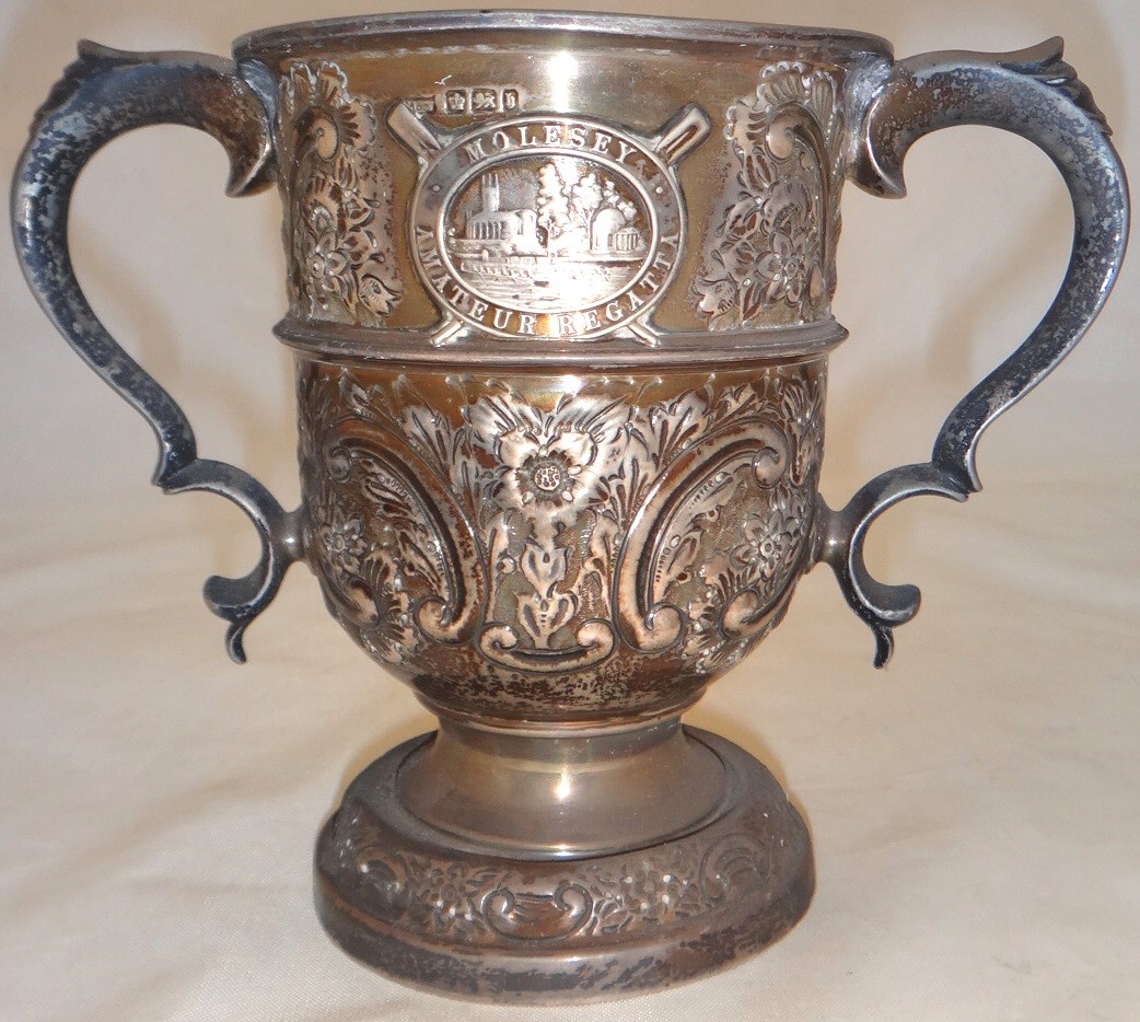 Appraisal: A silver twin handled trophy cup with floral foliate and