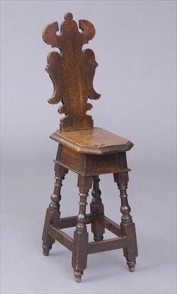 Appraisal: ITALIAN BAROQUE WALNUT SGABELLO With shaped back rest the oblong