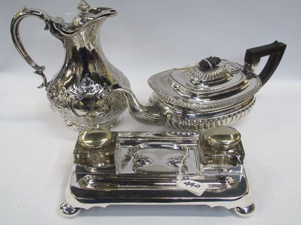 Appraisal: Lot comprising silver plated claret jug and a teapot and