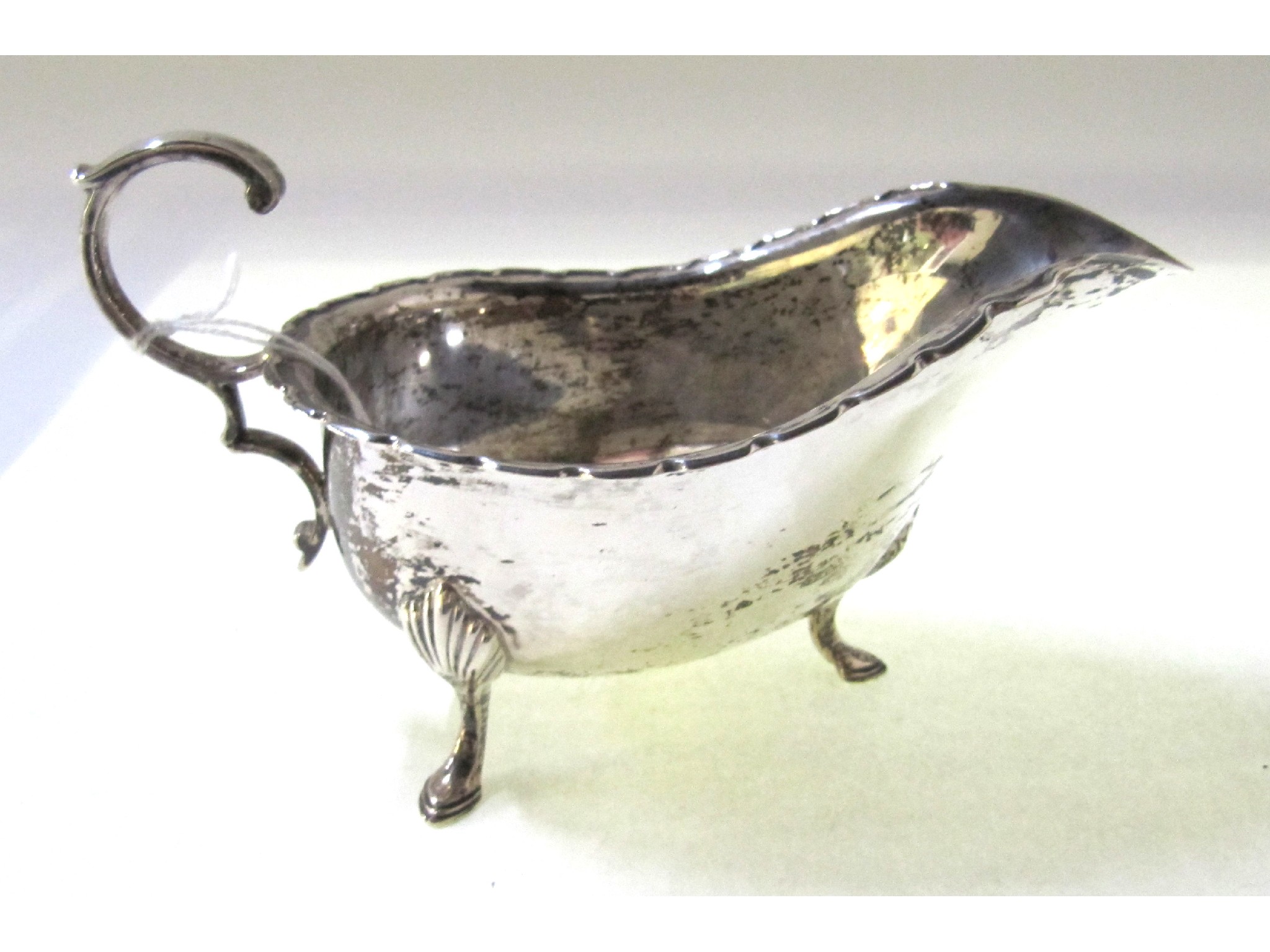 Appraisal: A silver sauce boat Sheffield