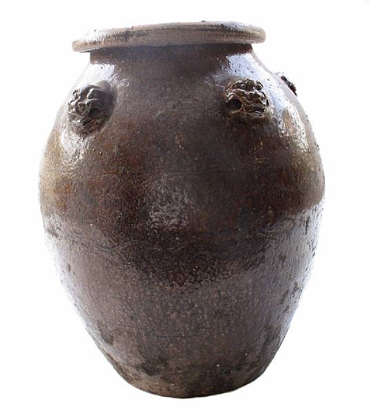 Appraisal: A Chinese iron glazed ceramic storage jar th century height