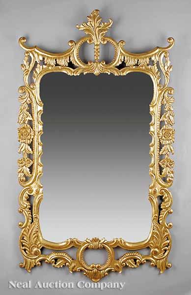 Appraisal: A Pair of Continental Rococo-Style Carved Giltwood Mirrors early th