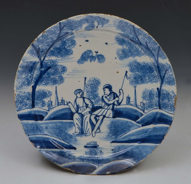 Appraisal: AN TH CENTURY DELFTWARE PLATE circa - depicting two figures