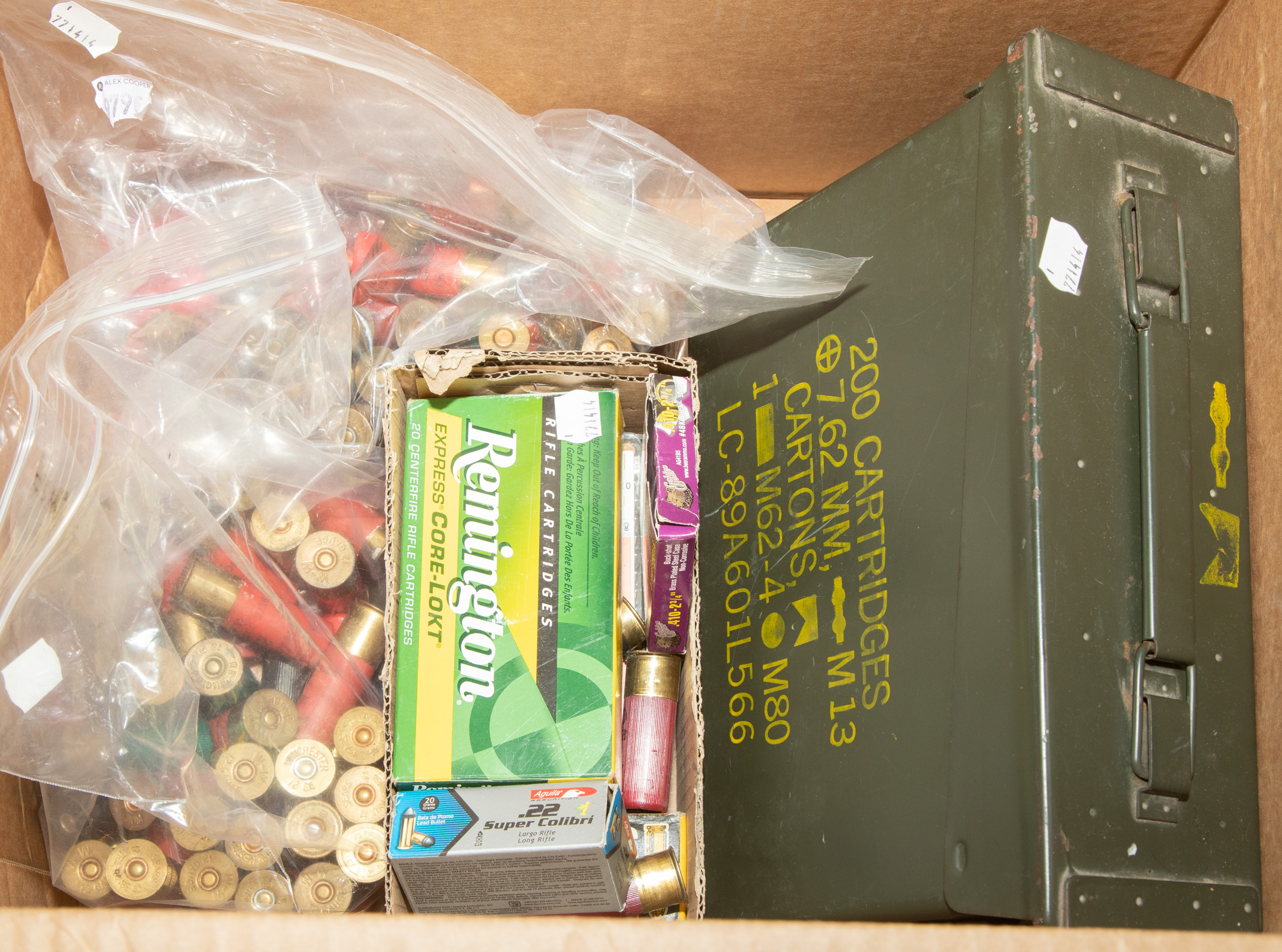 Appraisal: ASSORTED RIFLE SHOT GUN AMMUNITION And a metal ammo case