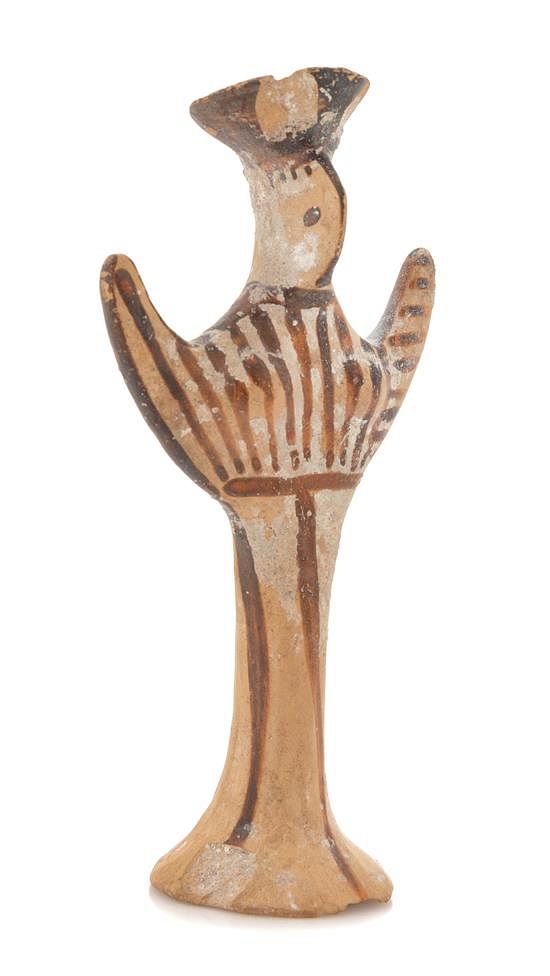 Appraisal: A Mycenaean Terra Cotta Psi Figure Height inches A Mycenaean