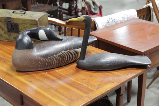 Appraisal: TWO LARGE DECOYS Both are signed A carved and painted