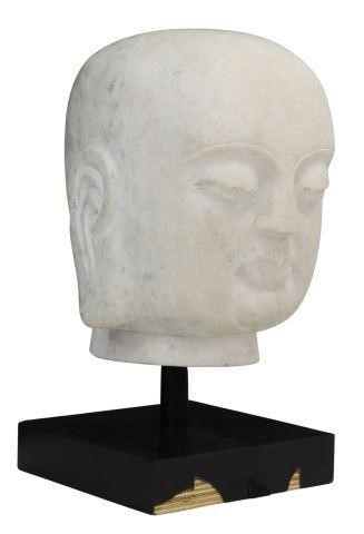 Appraisal: Large white marble Buddha head raised on a display stand