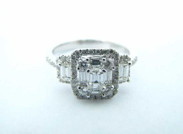 Appraisal: An K white gold lady's diamond fashion ring by HJ