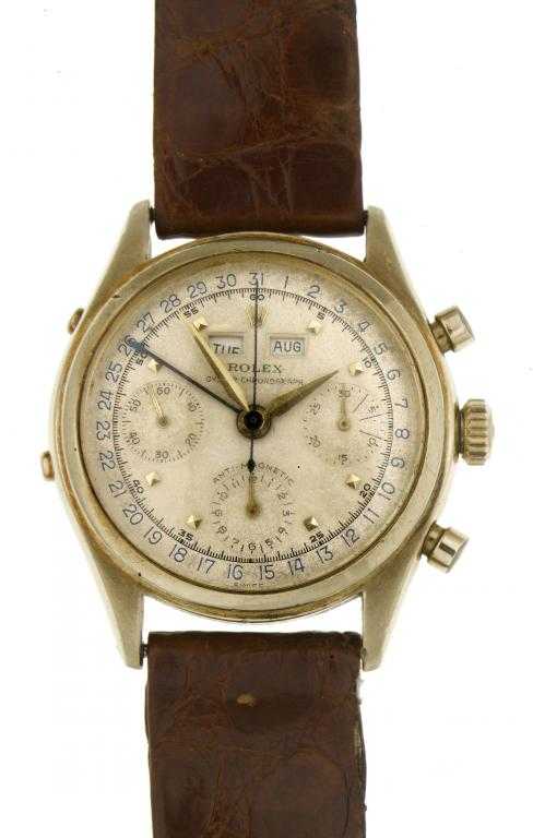 Appraisal: A ROLEX CT GOLD TRIPLE CALENDAR OYSTER CHRONOGRAPH WRISTWATCH REF