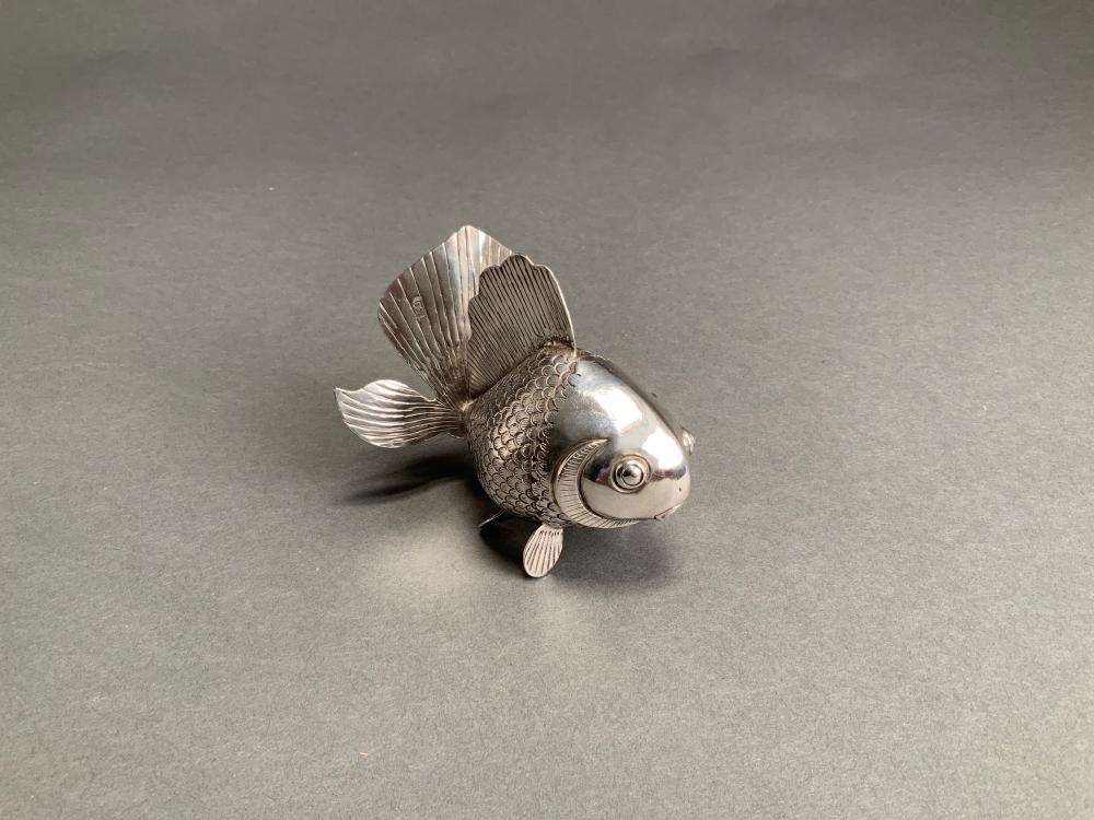 Appraisal: -SILVER ARTICULATED FISH H X L X IN X CM