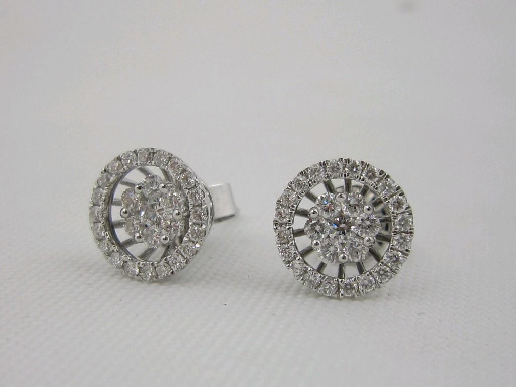 Appraisal: A pair of Diamond Ear Studs each pav-set cluster of