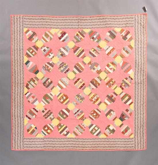 Appraisal: American cotton patchwork quilt in the ''Pinwheel'' pattern first half-