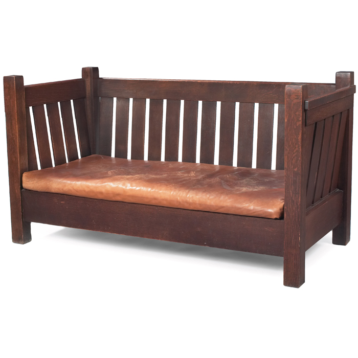 Appraisal: Good Gustav Stickley crib settle thirteen canted vertical slats at