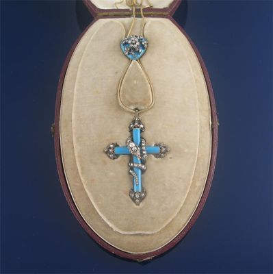 Appraisal: A Victorian cruciform pendant the blue enamel cross with entwined