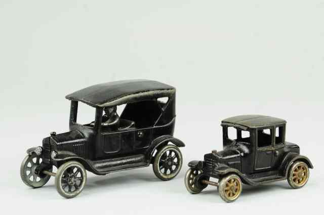 Appraisal: ARCADE TOURING CAR AND MODEL 'T' COUPE Both cast iron