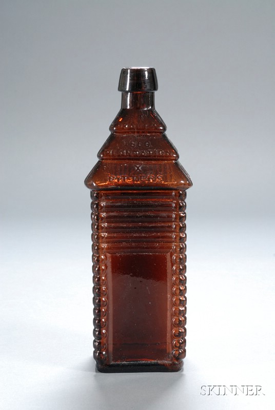 Appraisal: St Drake's Puce Glass Cabin-form Bitters Bottle - six-log example