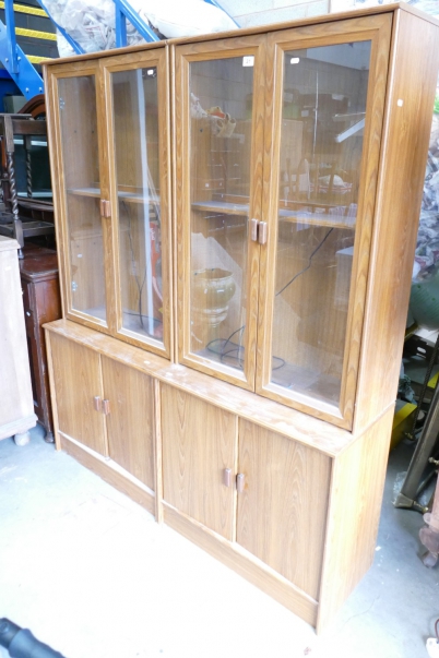 Appraisal: Glass fronted walnut display cabinet comprising of sections