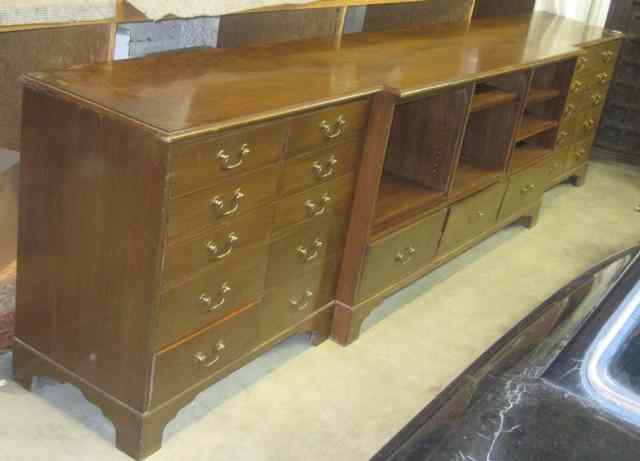 Appraisal: LONG WALNUT BREAKFRONT COLLECTOR'S CABINET CHEST George III style English