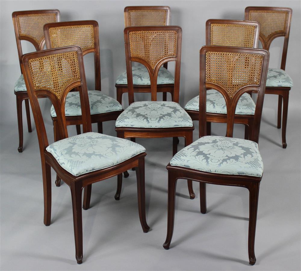 Appraisal: EIGHT ART NOUVEAU STYLE CANED DINING CHAIRS the back with