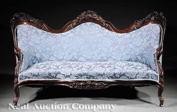 Appraisal: An American Rococo Carved and Laminated Rosewood Sofa mid- th