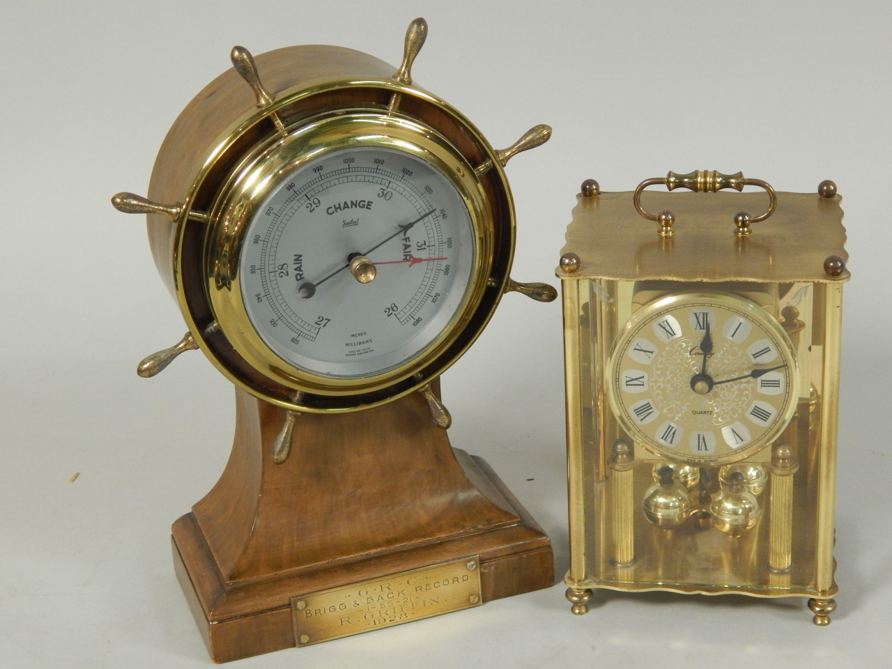 Appraisal: A Sestrel aneroid barometer the walnut case designed as a